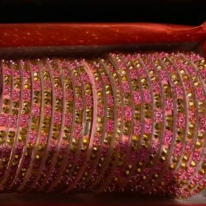 Pink and gold bangles new in box